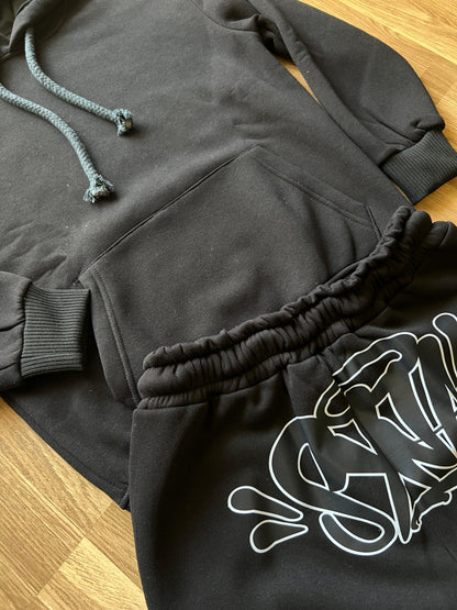 Chandal Syna World Negro Logo Negro